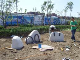 hj1736 石雕—箱包_青島國際服裝城不銹鋼雕塑、石雕、玻璃鋼雕塑_濱州宏景雕塑有限公司